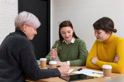 office-workers-working-together-as-team-scaled